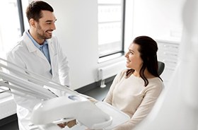 Dentist and patient having a relaxed conversation