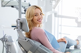 Happy patient looking over her shoulder